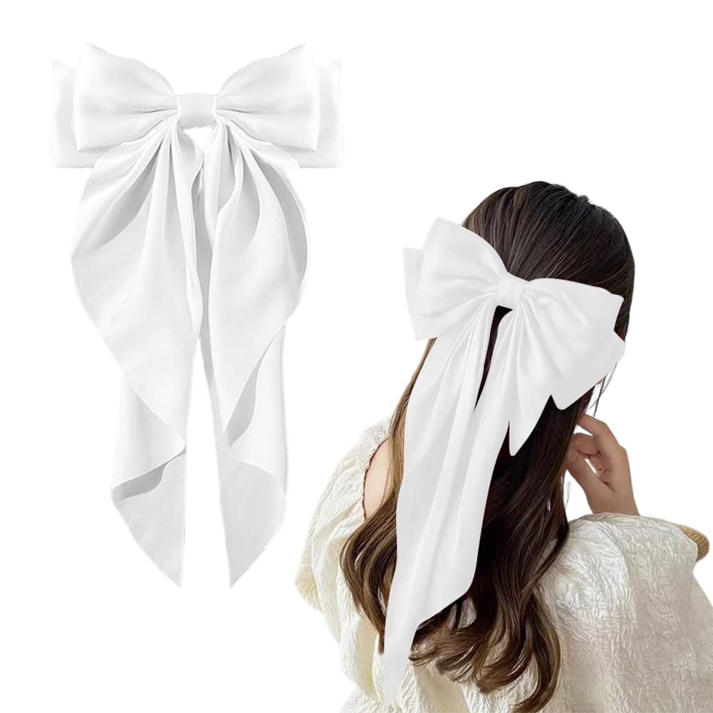 Kefley front view of white satin bow clip showing elegant shape and tails