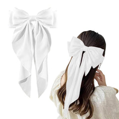 Kefley front view of white satin bow clip showing elegant shape and tails
