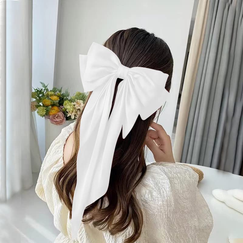 Kefley bow beside a hand to show scale and easy-to-wear size