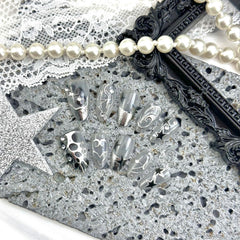 KEHKFSEF close-up of silver chrome and 3D rhinestones highlighting decorative detail