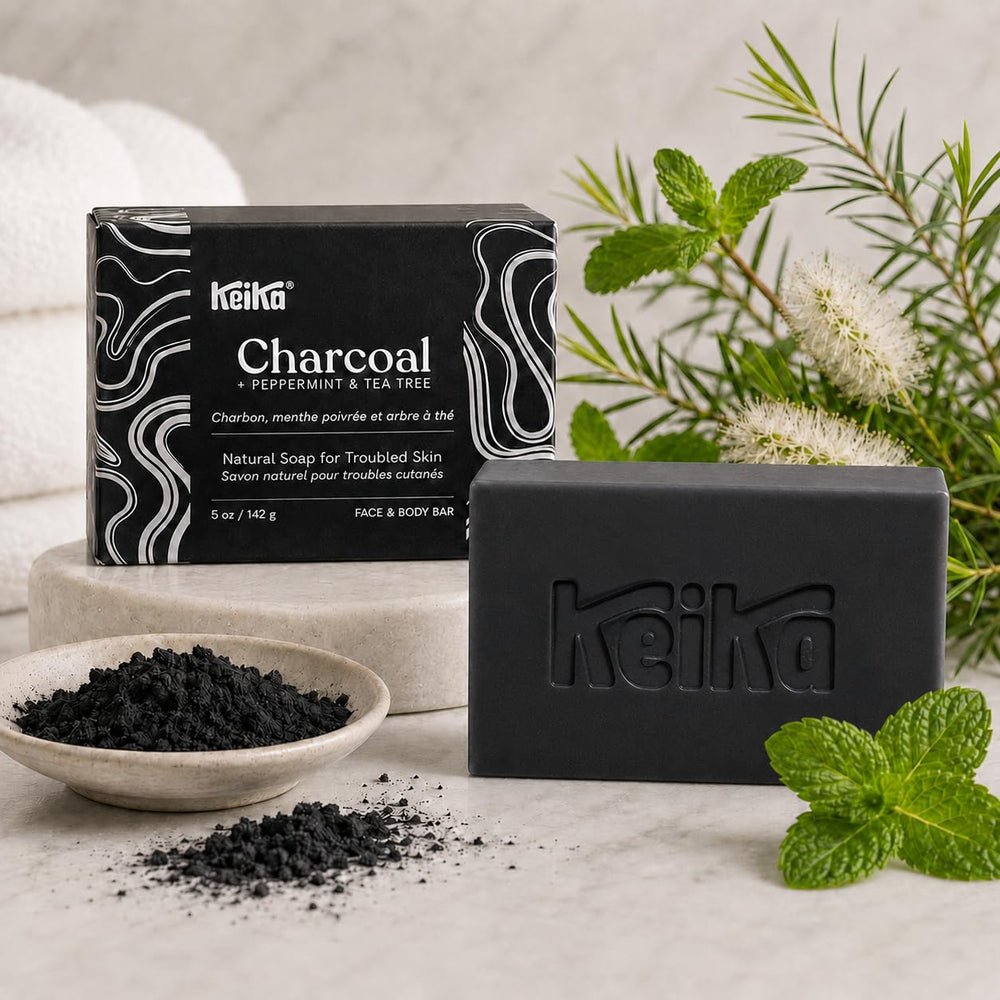 Keika ingredients display with charcoal and shea butter showing natural nourishment