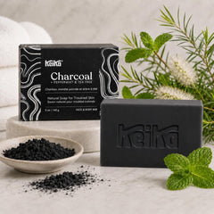 Keika ingredients display with charcoal and shea butter showing natural nourishment