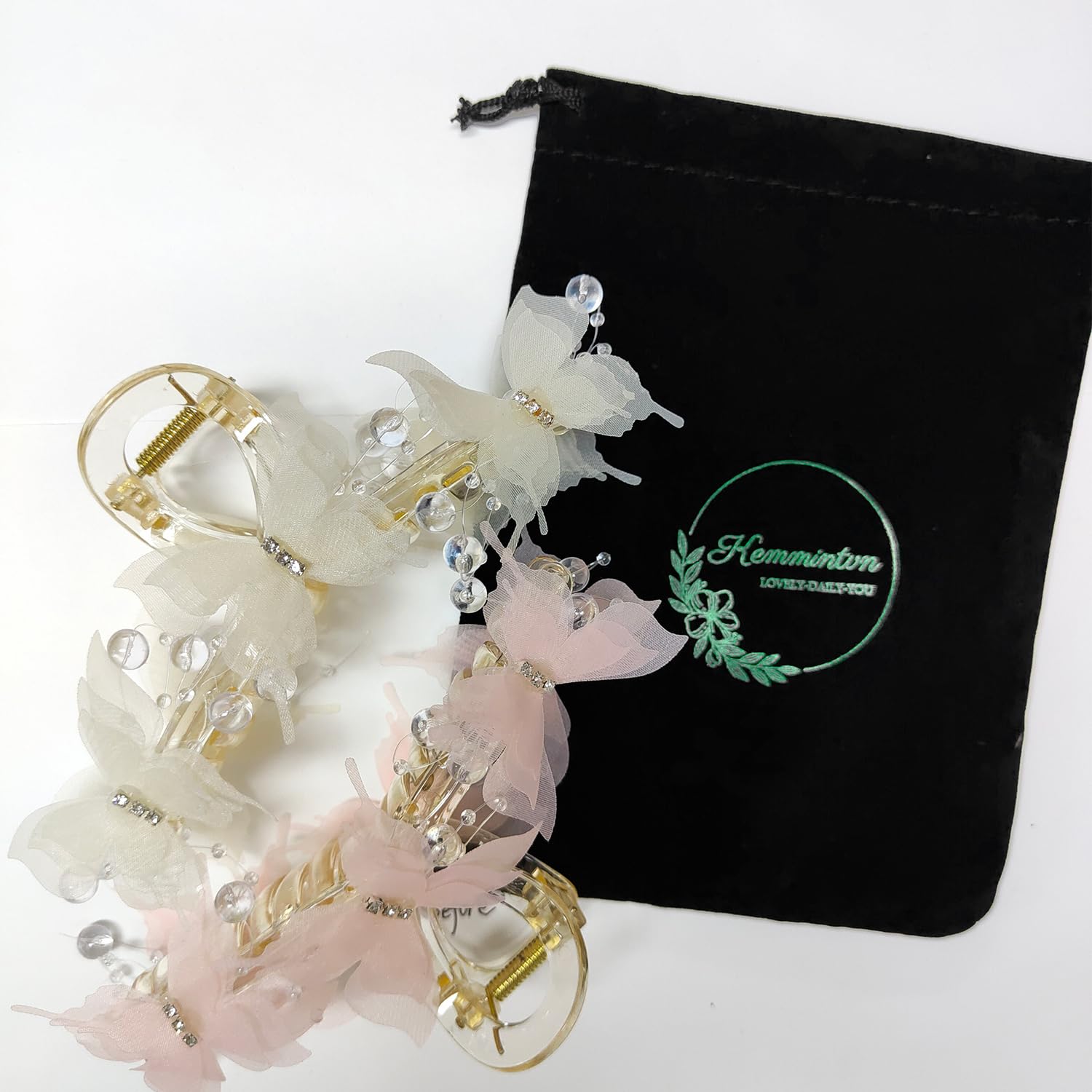 KEMMINTVN close-up of pearl and crystal embellishments adding sparkle