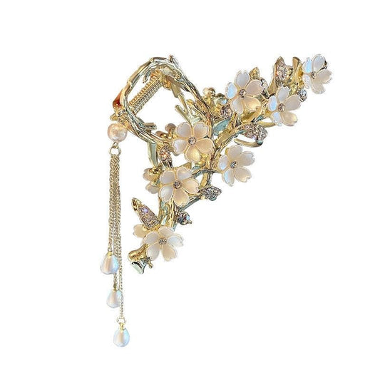 Kemmintvn gold clip front view showing floral design and elegant finish