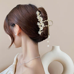 Kemmintvn cascading pearl tassels detail adding movement and refinement