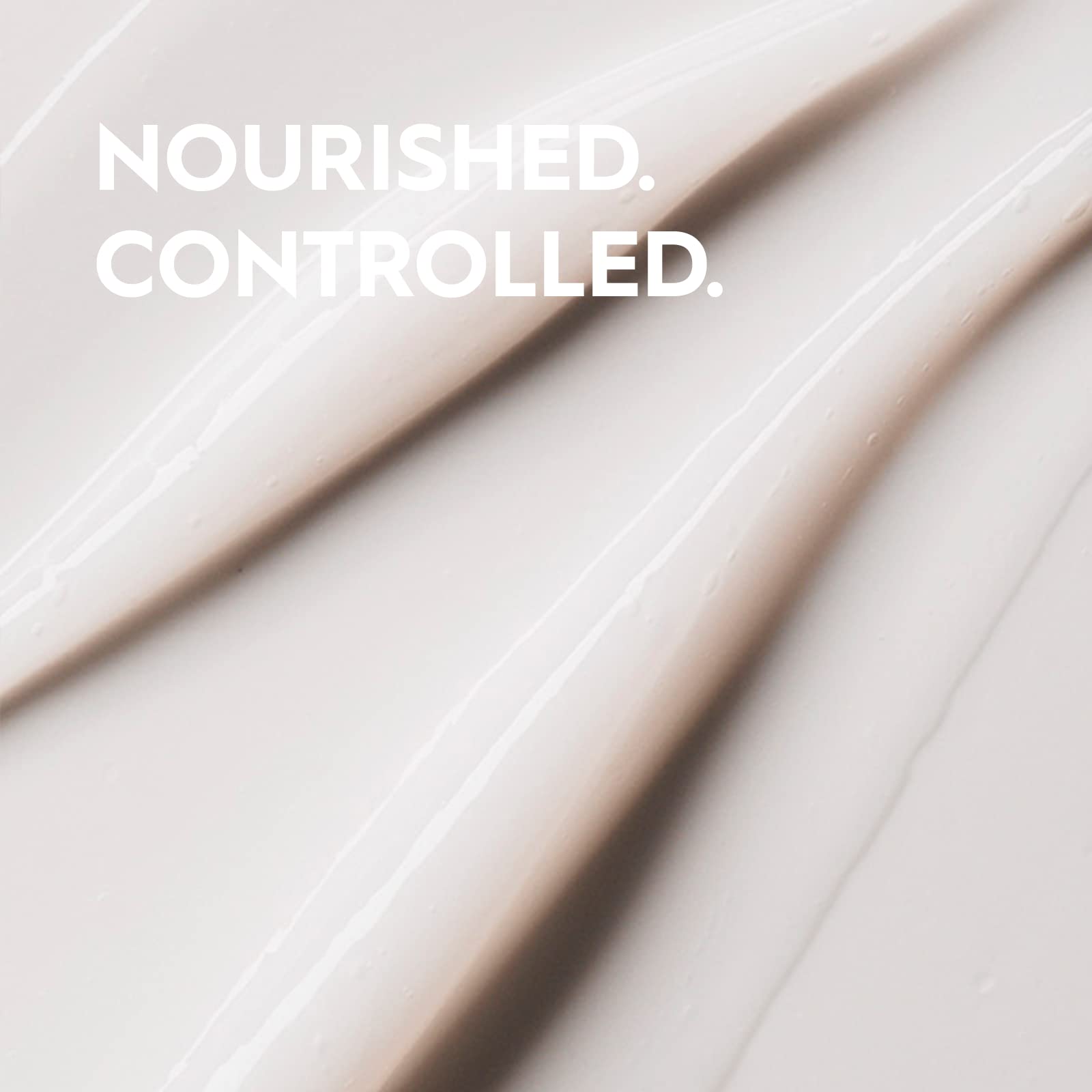 Kerasilk conditioner on hand showing detangling ease