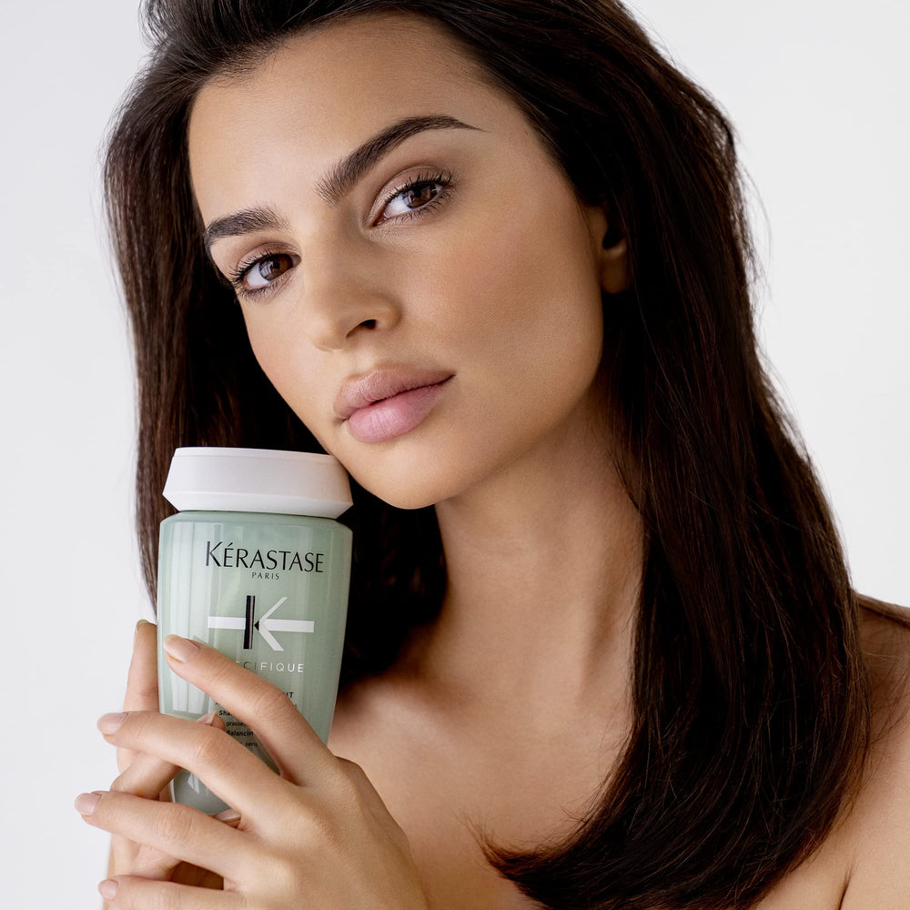 KÉRASTASE ingredient list closeup featuring amino acids and vitamin B6 for protection benefit