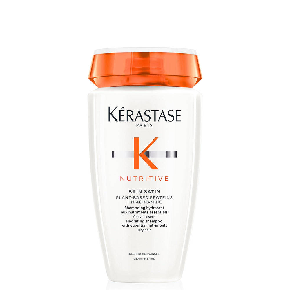 KÉRASTASE bottle front view showing elegant packaging and hydration benefit