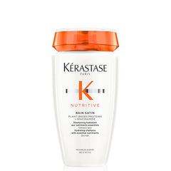 KÉRASTASE bottle front view showing elegant packaging and hydration benefit