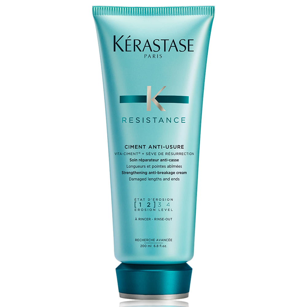 KÉRASTASE front bottle showing product benefits and brand