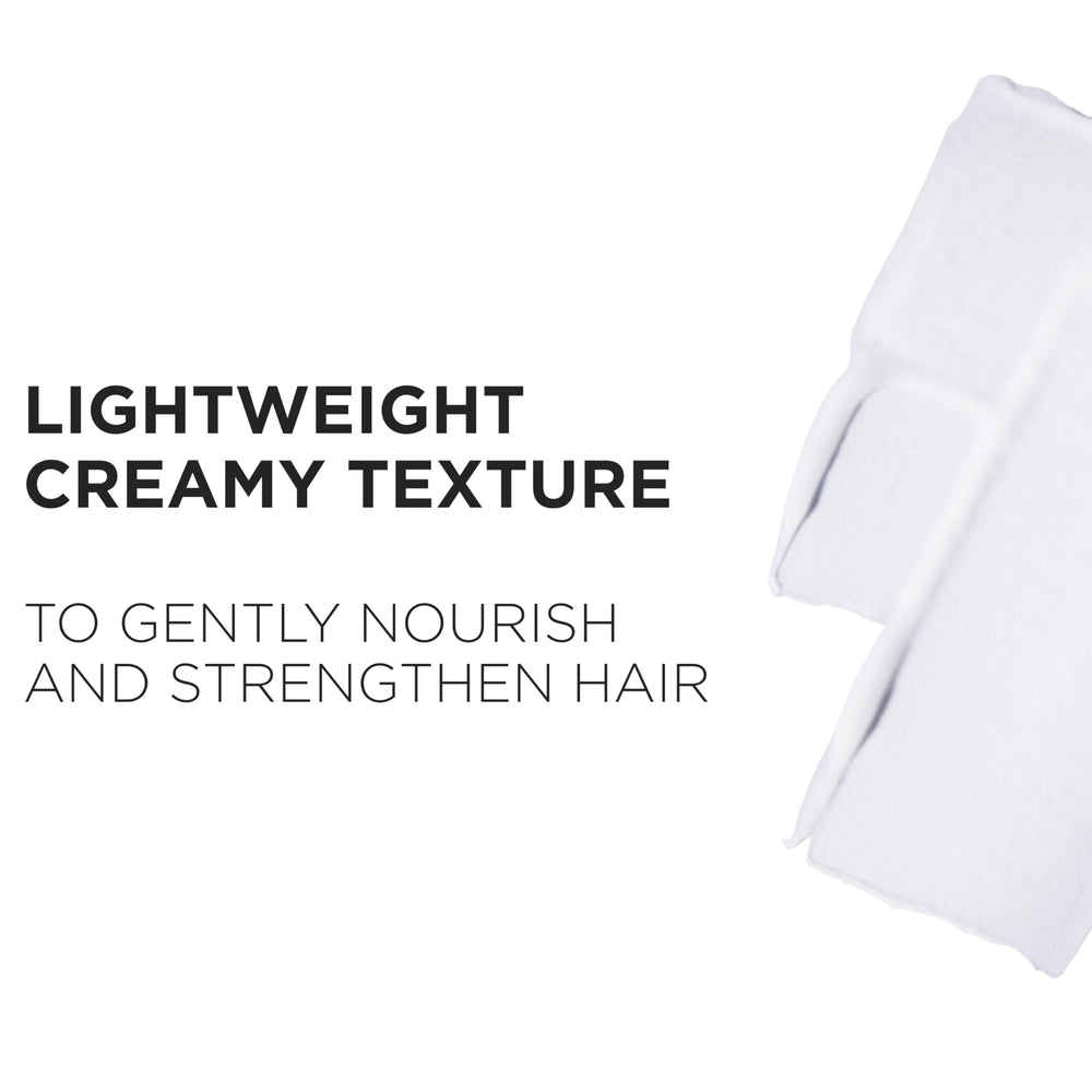 KÉRASTASE Genesis cream texture close-up showing lightweight formula