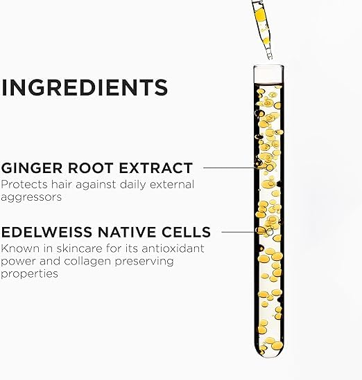 KÉRASTASE shampoo in hand lathering hair for effective scalp clarity