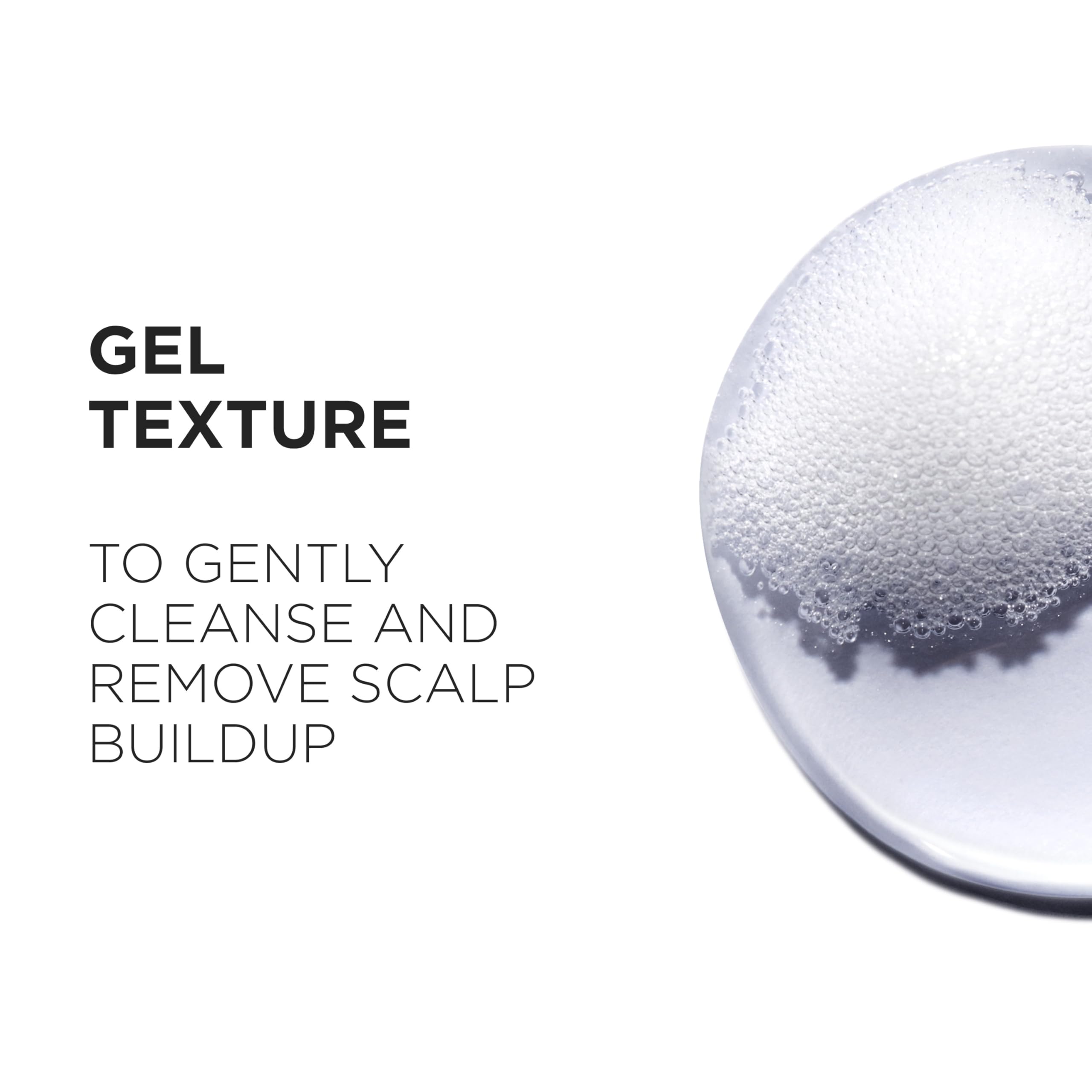 KÉRASTASE Genesis foamy lather in hand, illustrating gentle cleansing and detangling