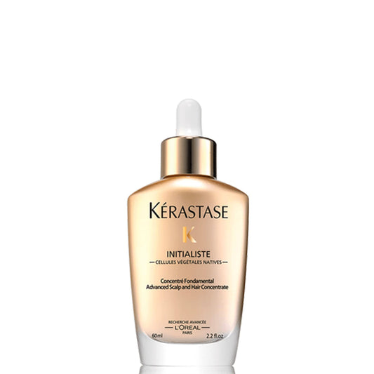 KÉRASTASE product front packaging showing sleek bottle and label benefit