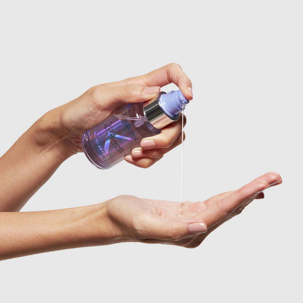 KÉRASTASE shiny blonde hair after serum use showing improved radiance