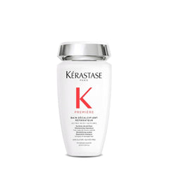 KÉRASTASE front bottle shot showing sleek packaging and premium benefit