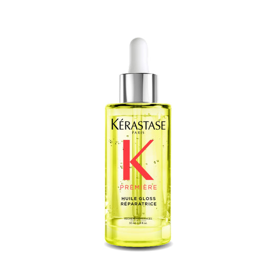 KÉRASTASE front bottle showing sleek packaging and instant shine benefit