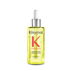 KÉRASTASE front bottle showing sleek packaging and instant shine benefit