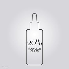 KÉRASTASE label close-up featuring citric acid and glycine for repairing benefit