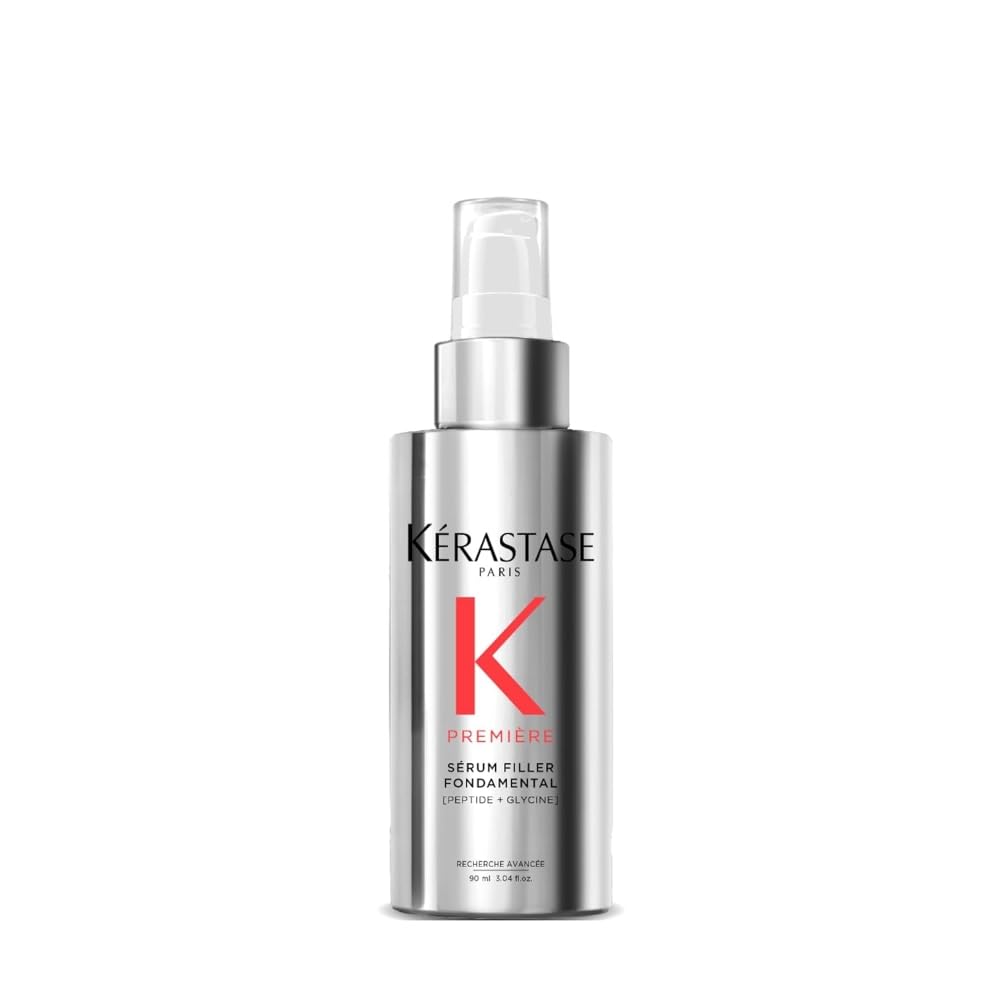 KÉRASTASE bottle front view showing sleek design and label benefit