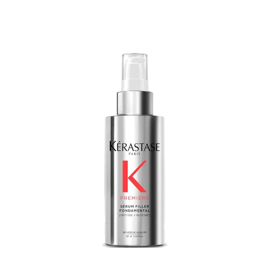 KÉRASTASE bottle front view showing sleek design and label benefit