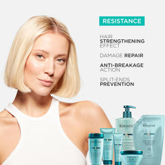 KÉRASTASE 16.9 fl oz bottle held in hand showing true size benefit