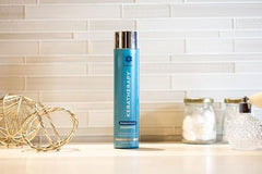 KERATHERAPY dispensing shampoo into hand for easy lathering benefit