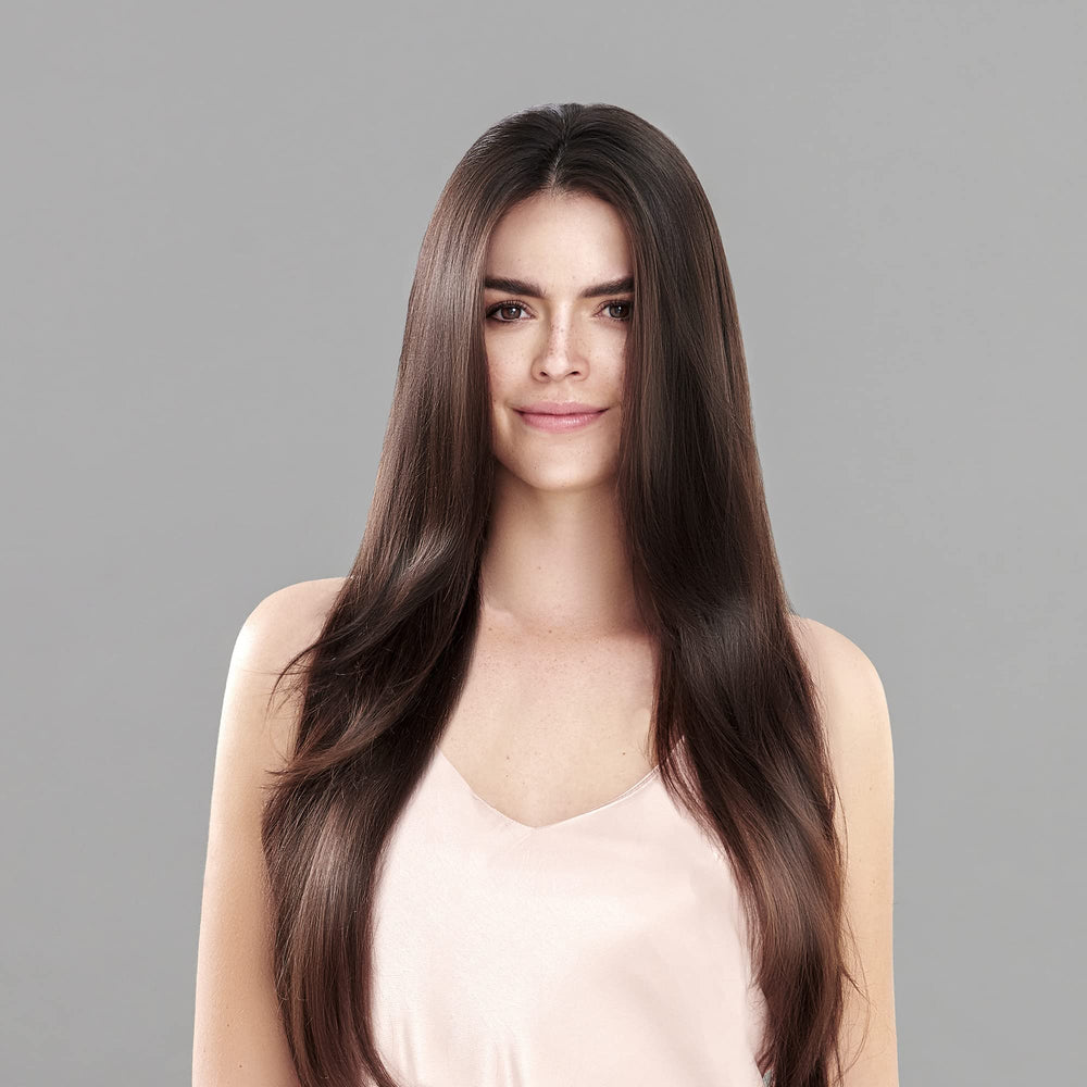 Keratin Complex pump dispensing shampoo foam for gentle, effective cleansing