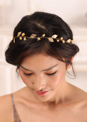 Kercisbeauty headband styled in bridal updo demonstrates secure finish