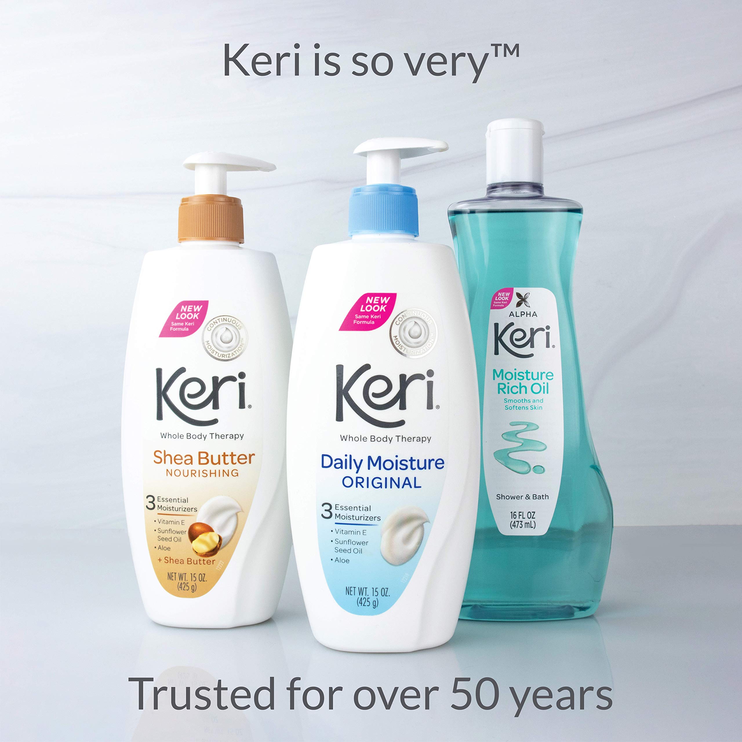 Keri 15 oz bottle beside everyday items to show portable size