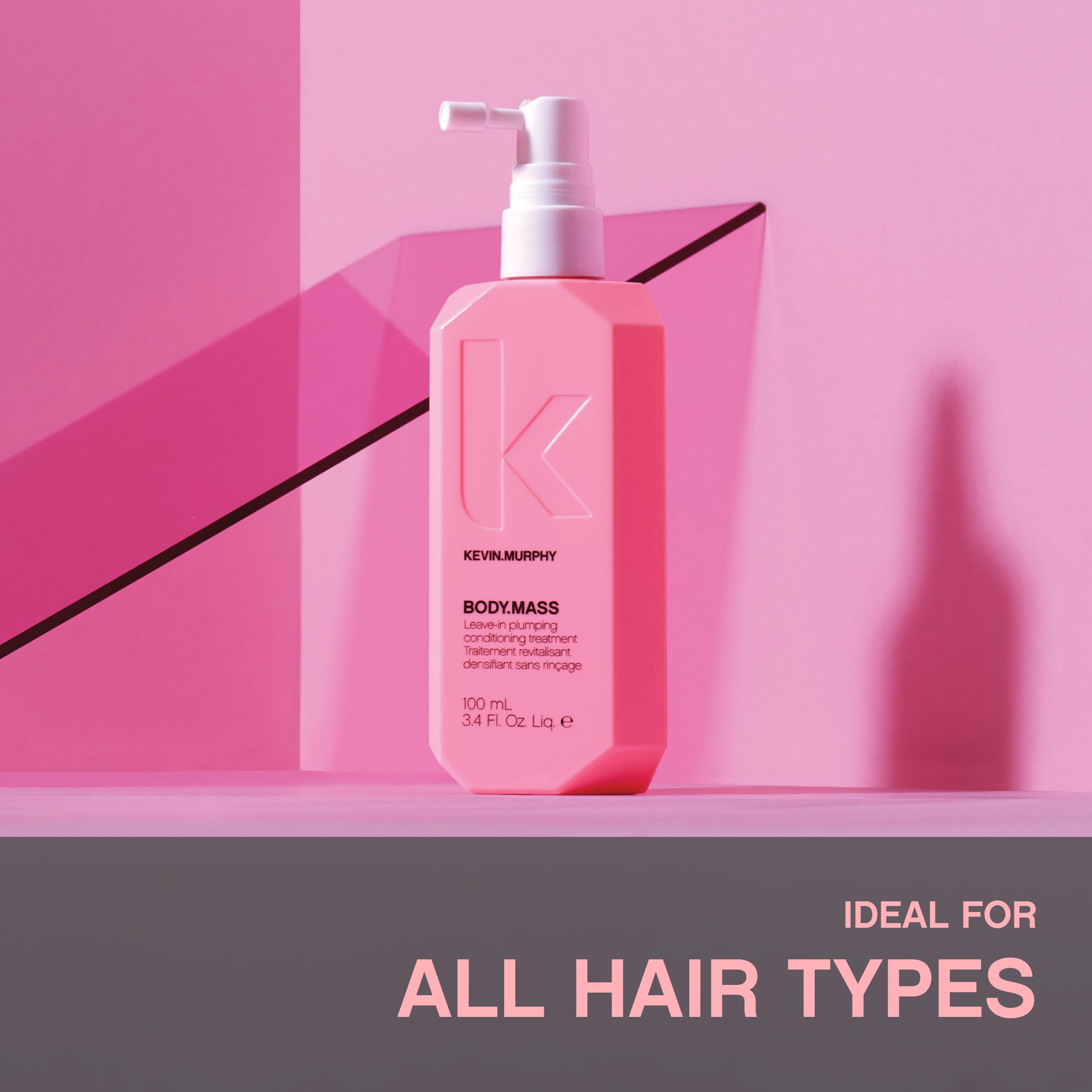 KEVIN.MURPHY BODY.MASS applied to damp hair in hand for improved lift