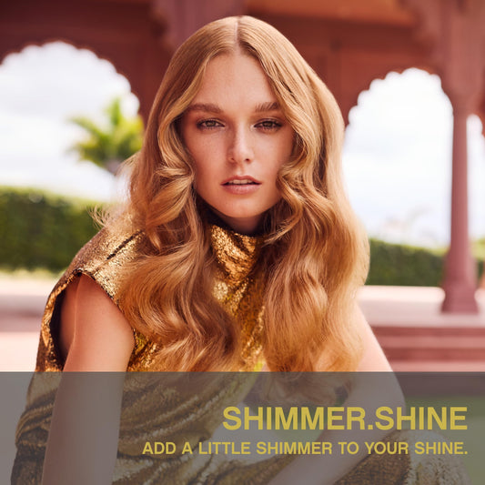 KEVIN.MURPHY mist spraying onto hair demonstrates even shine application benefit