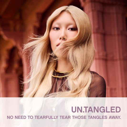 KEVIN.MURPHY closeup of UN.TANGLED label highlighting natural ingredient benefits