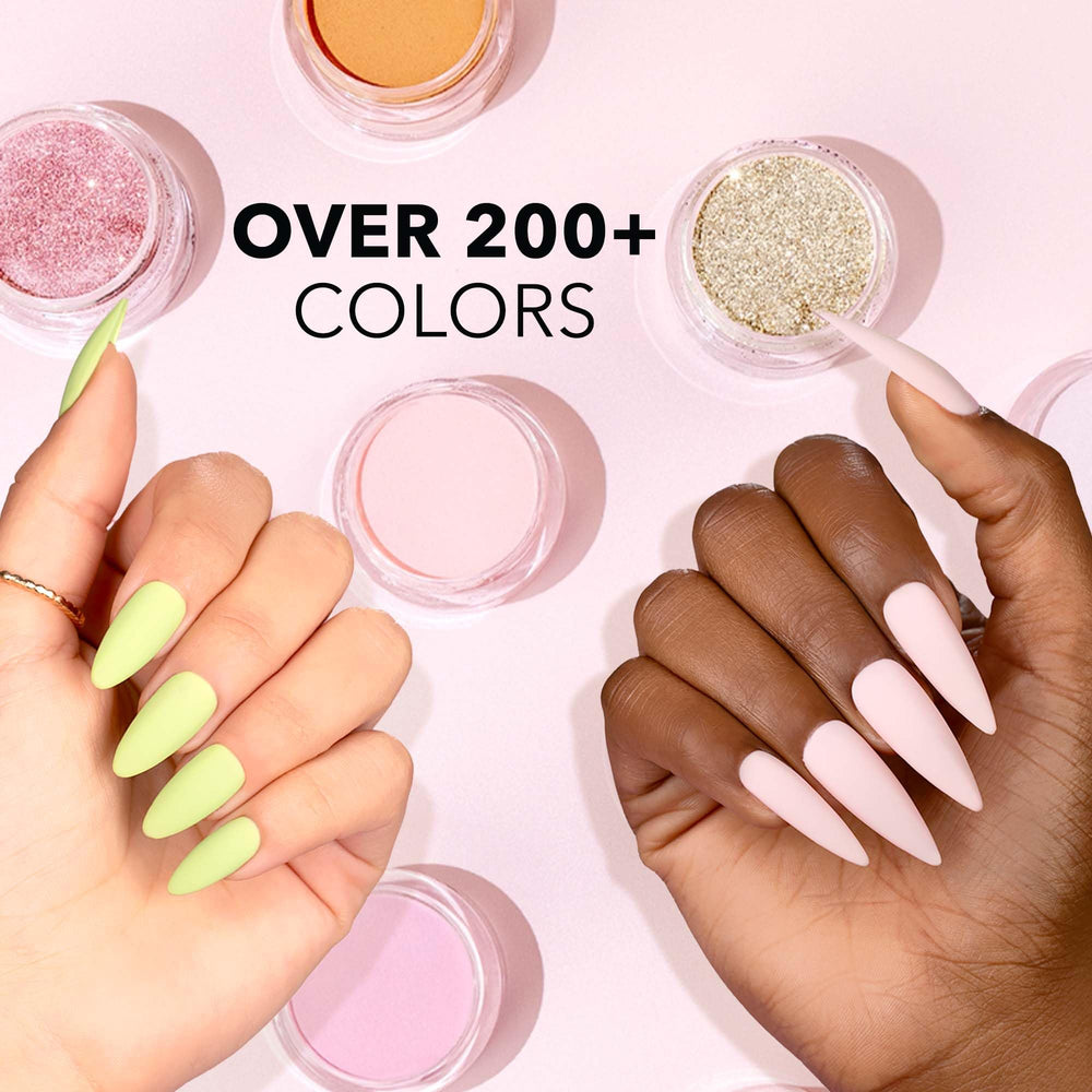 Kiara Sky finished milk-bath manicure on hands showing soft creamy white results
