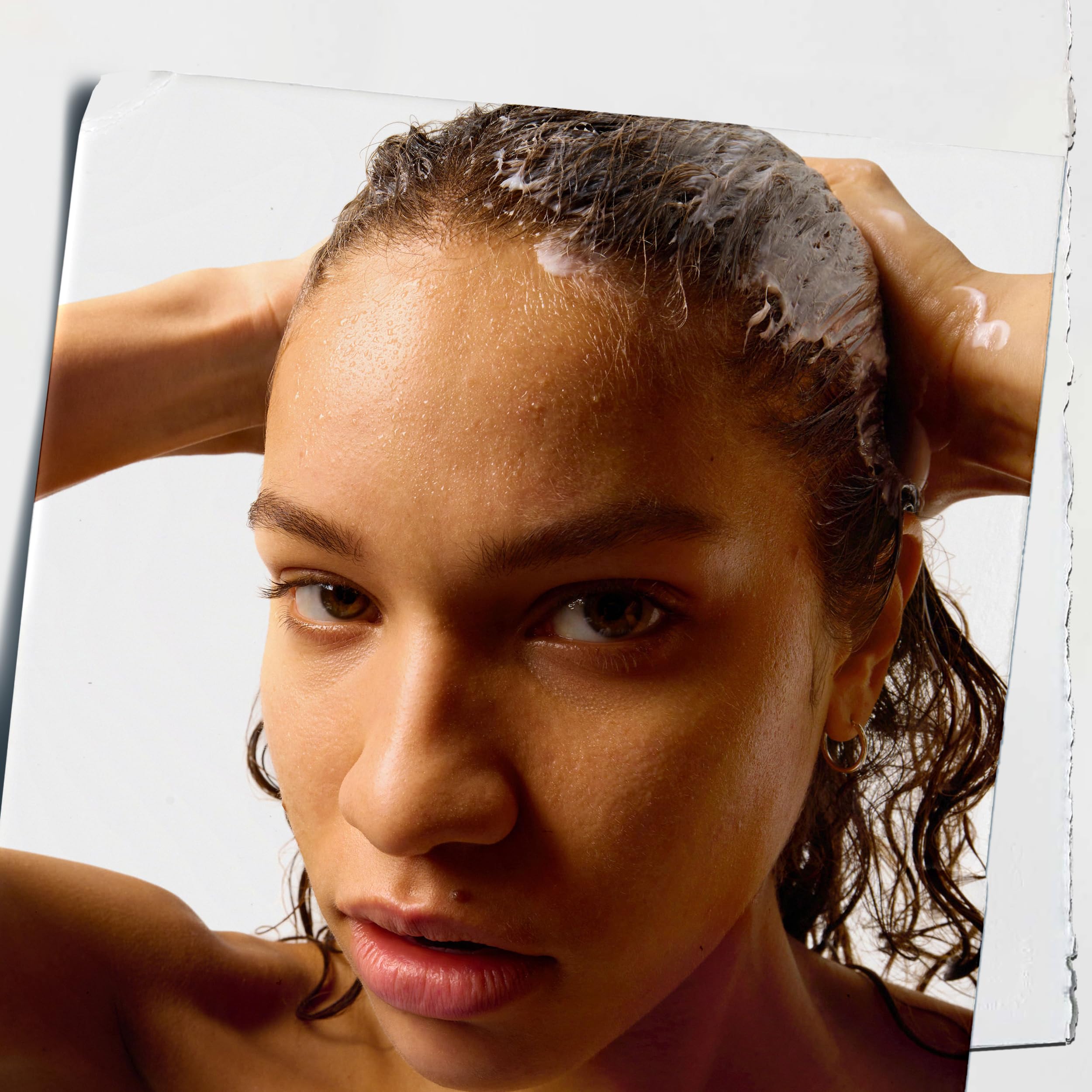 Kiehl's conditioner creamy texture close-up demonstrating smooth spreadability