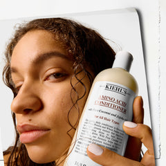 Kiehl's conditioner on bathroom shelf in lifestyle scene for daily use