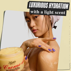 Kiehl's open jar revealing whipped body butter ready to scoop for nourishing application