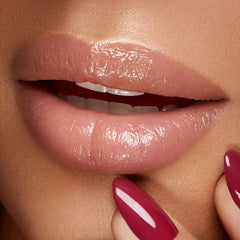 Kiko Milano on smiling model showing subtle color and boost to natural lips