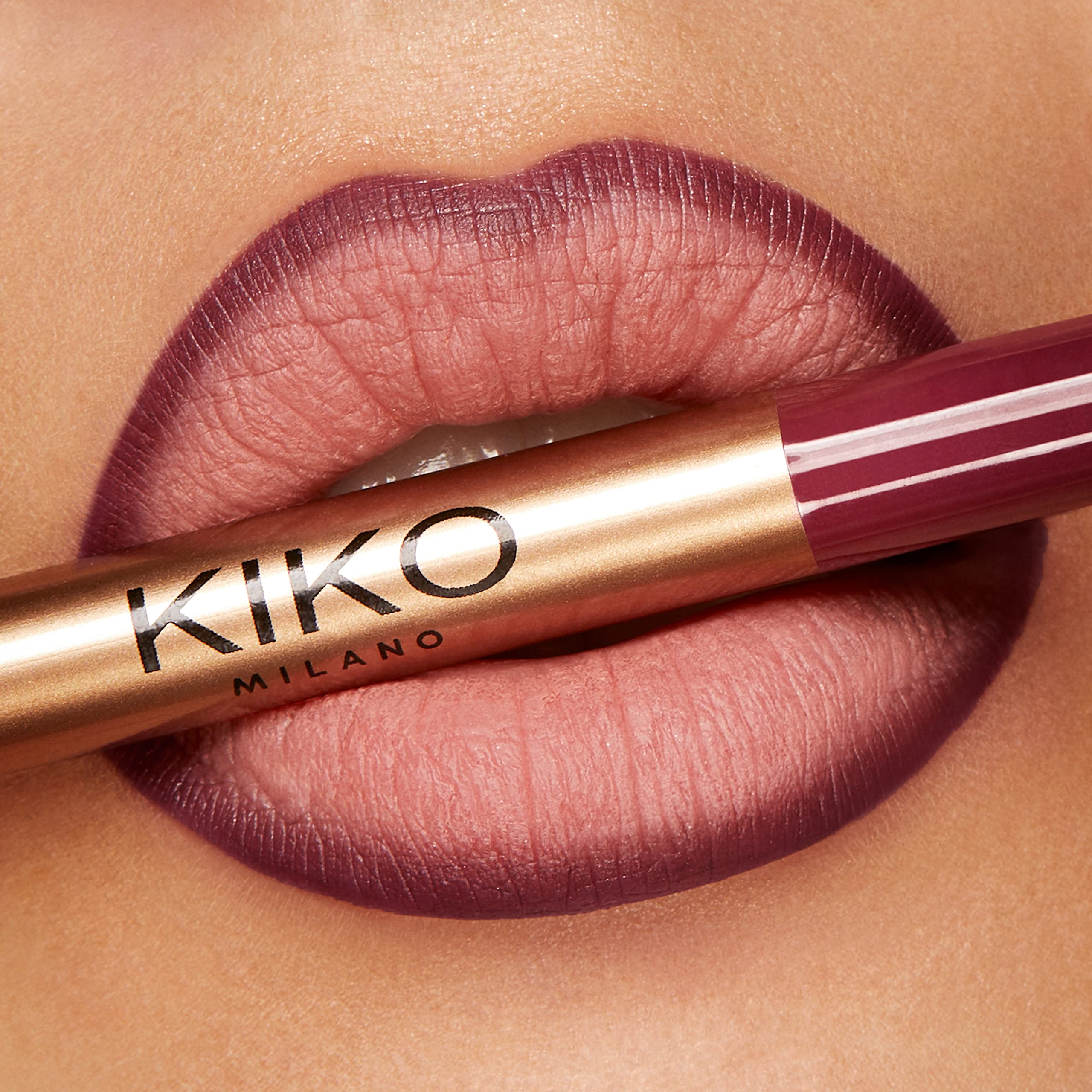 KIKO Milano lip liner in use on lips during application, helps long-lasting defined contour