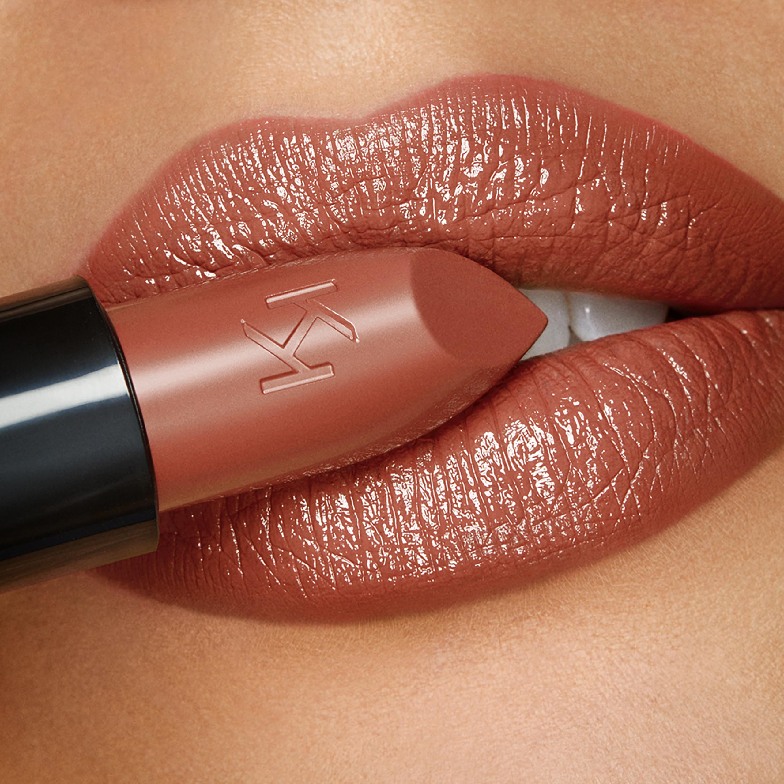 Kiko Milano lipstick applied on lips demonstrating luminous finish and full coverage