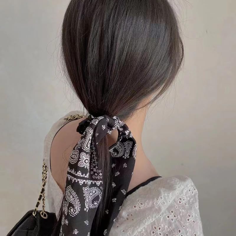 Kilener black and red scrunchies side-by-side offering styling versatility benefit