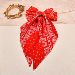 Kilener bow worn in toddler ponytail demonstrating secure, cute styling