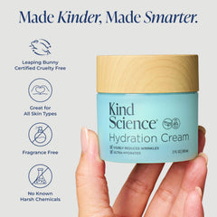 Kind Science 2 oz jar held in hand showing compact travel-friendly size