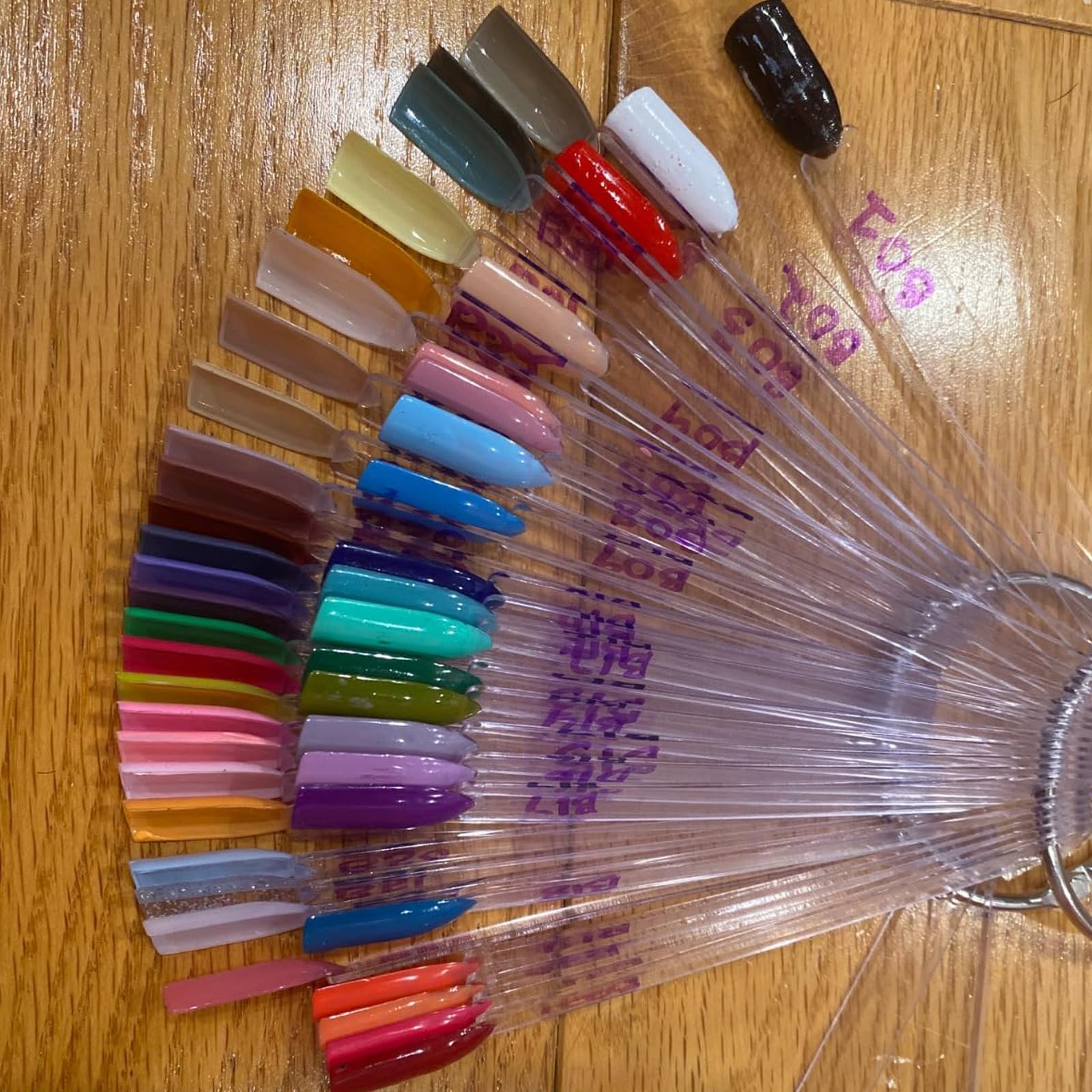 KINJOEK tips next to a ruler showing scale and practical size for storage