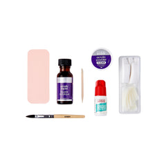 KISS sculpting brush, file, and manicure stick displayed for precise application