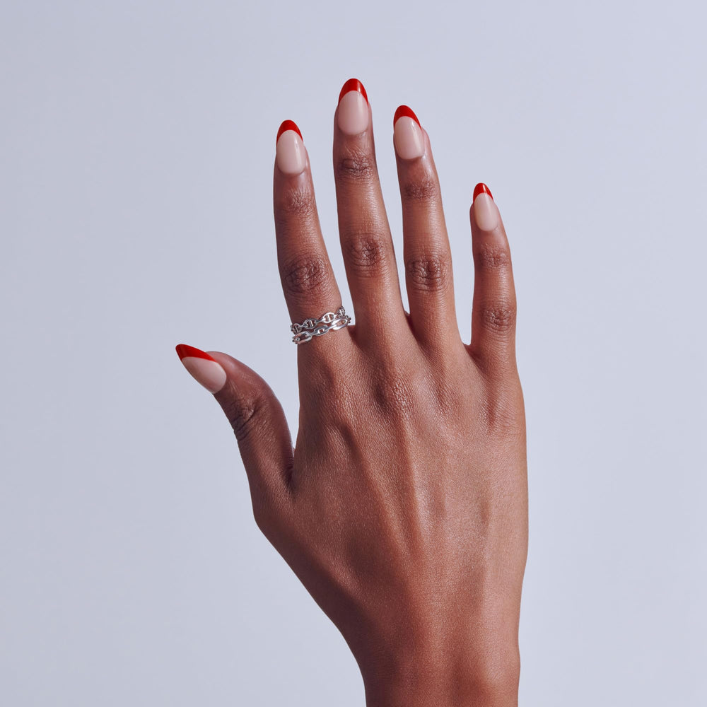 KISS close-up of almond-shaped nail edge for elegant look