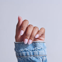 Close-up of KISS 'Friendship' pink design highlighting pattern detail and polish look