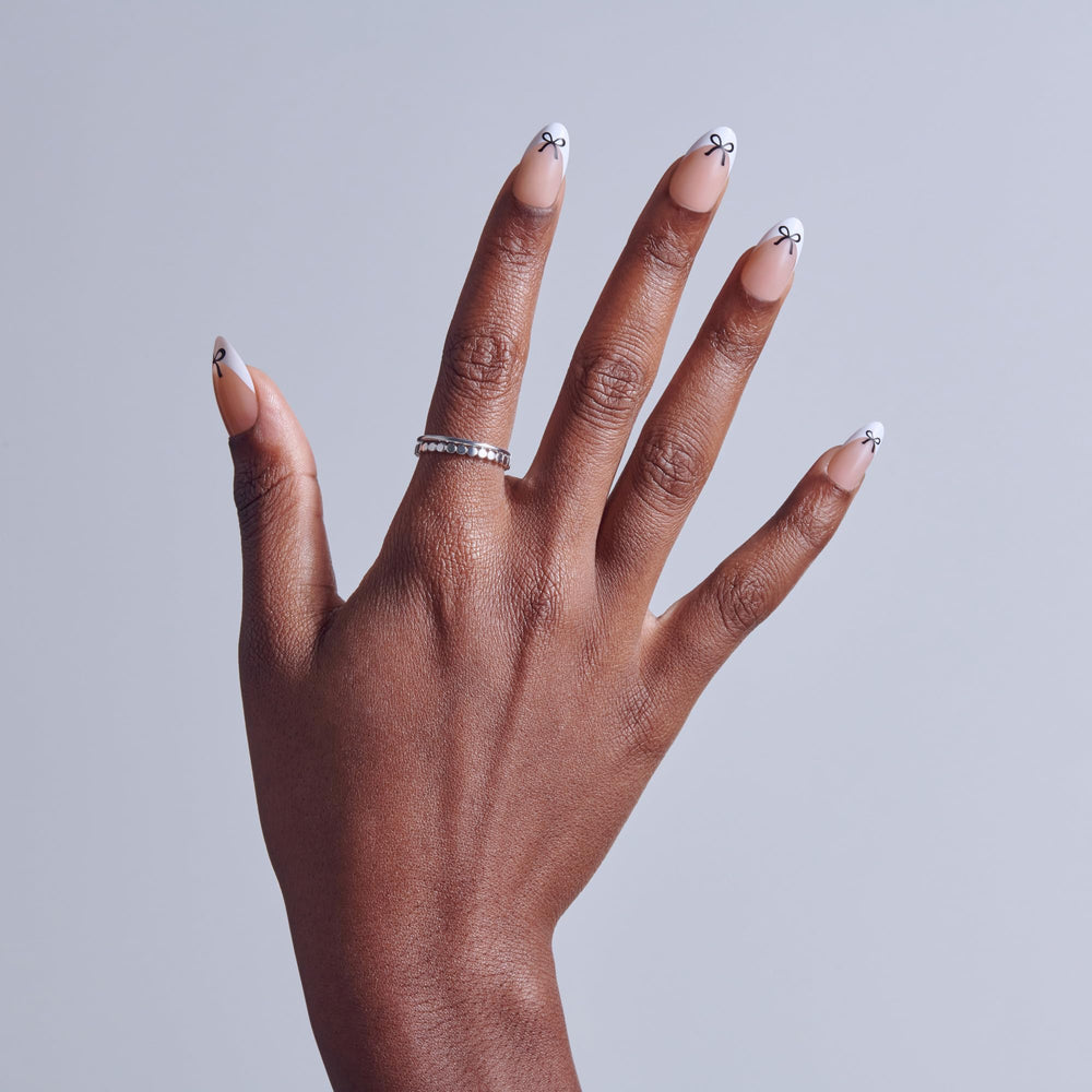 KISS Core nails displayed in a hand to show scale and natural look