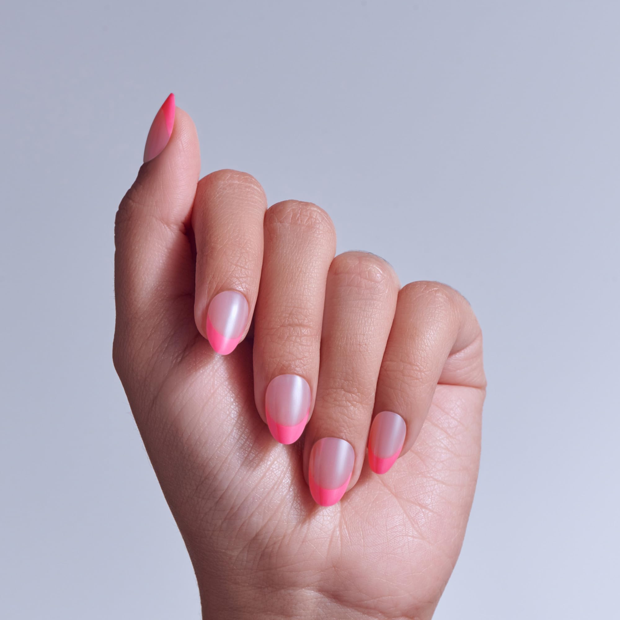 KISS close-up of pink almond nail showing glossy shine