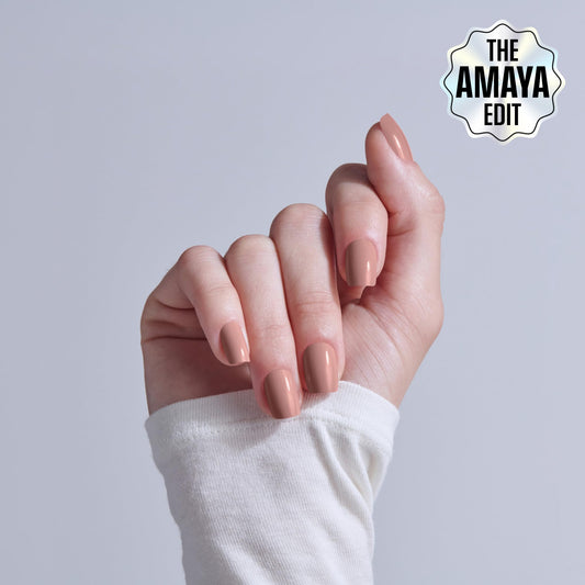 KISS Embullience close-up of nail array highlighting smooth beige finish and realistic look